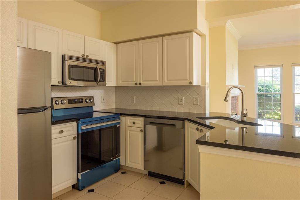 Photo 5 of 11603 Tomahawk Creek Parkway #G