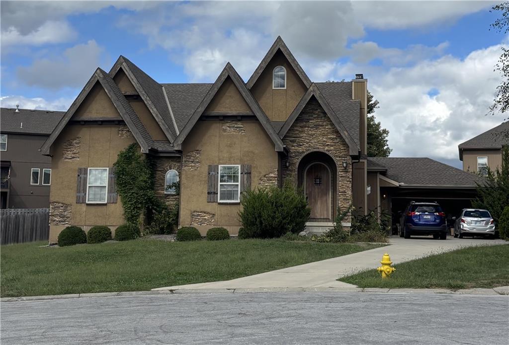 Photo of 1302 Aberdeen Circle in Raymore, MO
